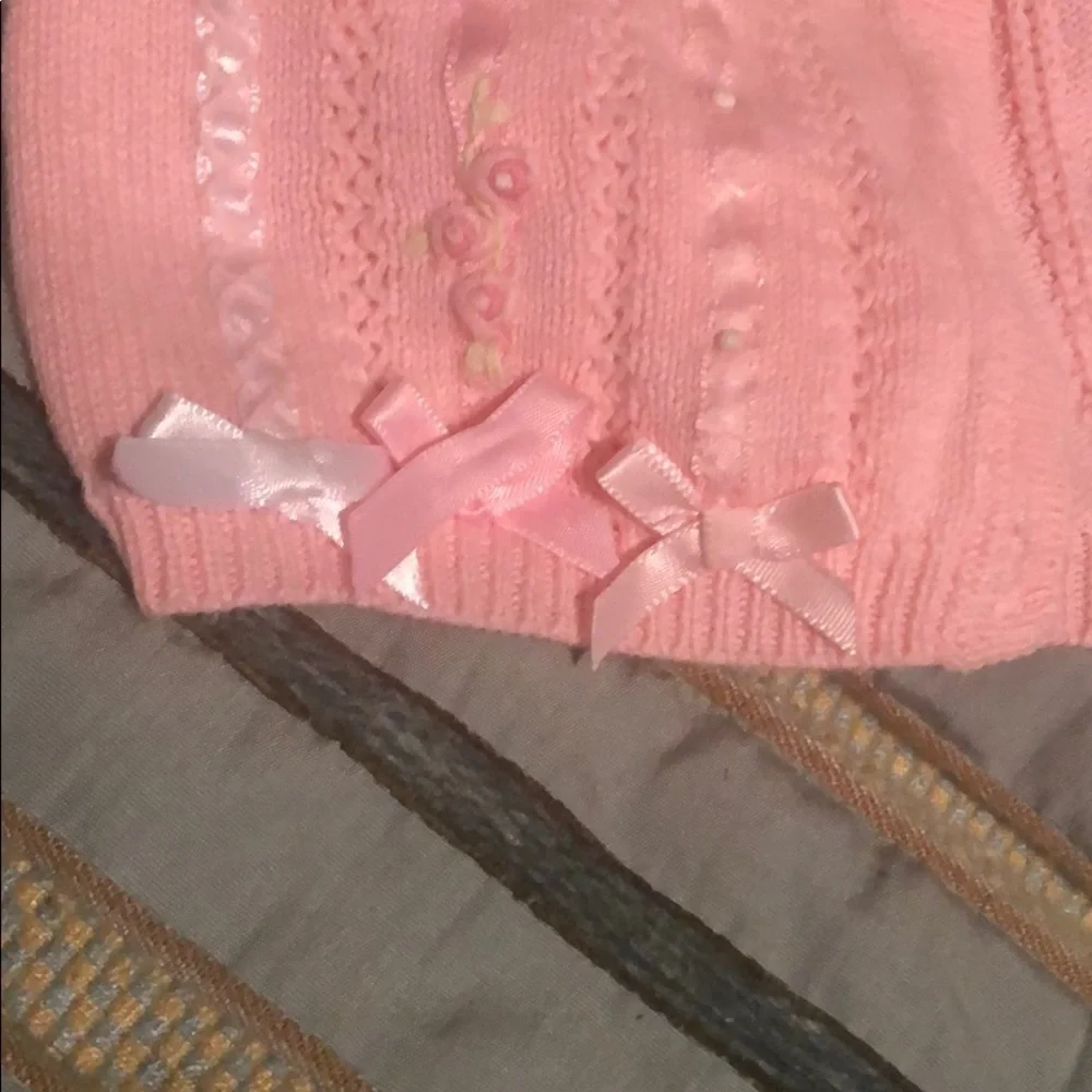 Pink button down sweater from Hartstrings